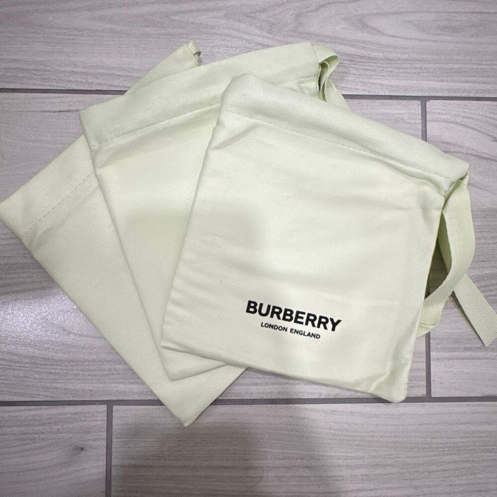 Brand new Burberry dust bags  THIS LISTING IS FOR ONE BAG Would fit a belt perfe